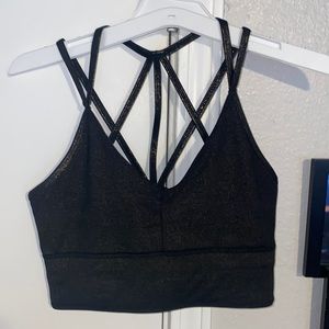 Born primitive sports bra!Great condition!Very gently worn.Black w/ gold sparkle